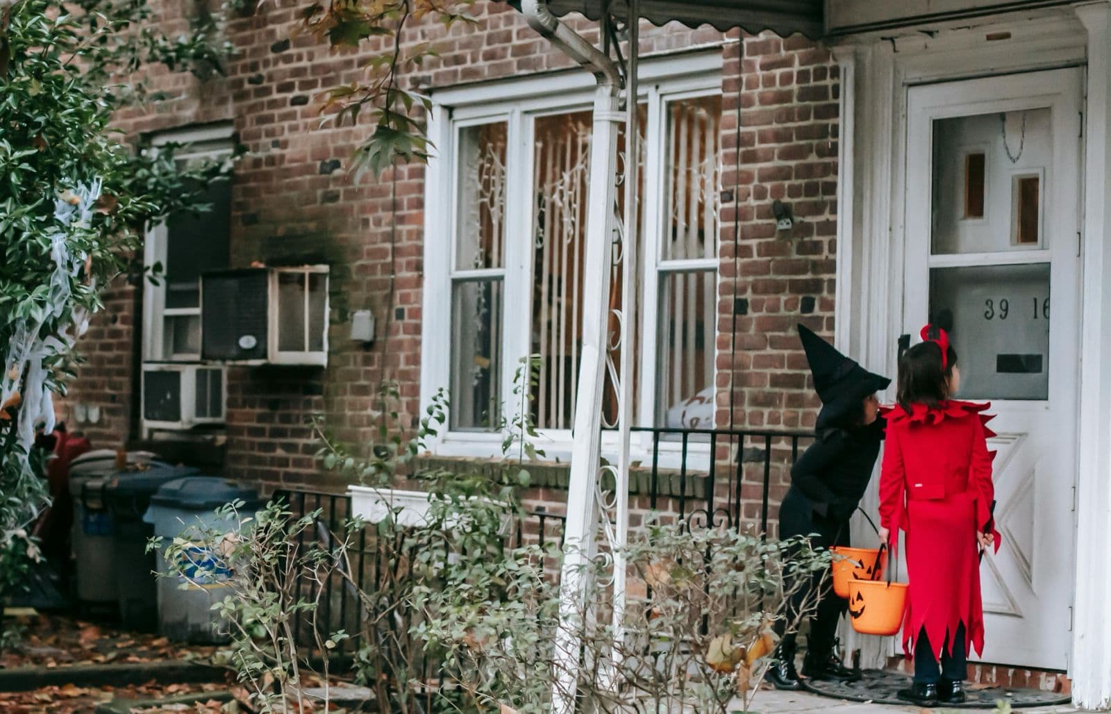 Halloween night with pumpkins and a locked door